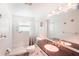 Clean bathroom with shower, toilet and granite vanity at 872 Mohawk Rd, Venice, FL 34293