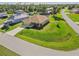 One-story house with driveway and a corner lot at 9325 Crugar Ter, Englewood, FL 34224
