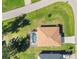 Overhead view of house, pool, and surrounding landscape at 9325 Crugar Ter, Englewood, FL 34224
