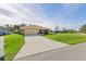 Charming one-story home with a well-maintained lawn at 9325 Crugar Ter, Englewood, FL 34224
