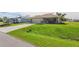 One-story home with attached garage and spacious yard at 9325 Crugar Ter, Englewood, FL 34224