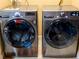 Modern laundry room with LG washer and dryer set at 9325 Crugar Ter, Englewood, FL 34224