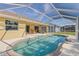 Large screened-in pool with ample seating at 9325 Crugar Ter, Englewood, FL 34224