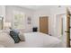 Bright bedroom with a comfortable bed and plenty of closet space at 9607 Sea Turtle Ter # 101, Bradenton, FL 34212