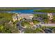 Community clubhouse with a grand entrance and landscaping at 9607 Sea Turtle Ter # 101, Bradenton, FL 34212