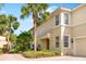 Well-maintained townhome with landscaping and a paved driveway at 9607 Sea Turtle Ter # 101, Bradenton, FL 34212