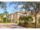 Attractive three-story home with a two-car garage and lush landscaping at 9607 Sea Turtle Ter # 101, Bradenton, FL 34212