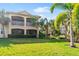 Townhome with a balcony and tropical landscaping at 9607 Sea Turtle Ter # 101, Bradenton, FL 34212