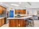 Well-equipped kitchen featuring stainless steel appliances and an island at 9607 Sea Turtle Ter # 101, Bradenton, FL 34212