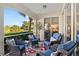 Relaxing screened lanai with comfortable seating for outdoor enjoyment at 9607 Sea Turtle Ter # 101, Bradenton, FL 34212
