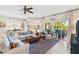 Relaxing living room with access to a spacious patio and water views at 9607 Sea Turtle Ter # 101, Bradenton, FL 34212