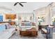 Cozy living room featuring two sofas and a coffee table, with kitchen access at 9607 Sea Turtle Ter # 101, Bradenton, FL 34212