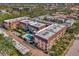 Aerial view of building, pool and surrounding area at 101 Park N Blvd # 111, Venice, FL 34285