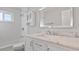 Clean bathroom with white subway tile and marble vanity at 1040 Hope St, Venice, FL 34285