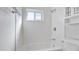 Bathroom with white subway tile and shower/tub combo at 1040 Hope St, Venice, FL 34285