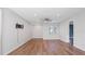 Bright bedroom with hardwood floors and a ceiling fan at 1040 Hope St, Venice, FL 34285