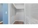 Walk-in closet with a single rod and shelf for hanging clothes and storage at 1040 Hope St, Venice, FL 34285