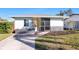 Front view of the charming house with stone accents at 1040 Hope St, Venice, FL 34285