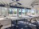 Bright community room with tables and chairs at 1100 Capri Isles Blvd # 212, Venice, FL 34292