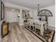 Bright dining room with decorative wall art and area rug at 1100 Capri Isles Blvd # 212, Venice, FL 34292