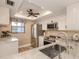 Updated kitchen with stainless steel appliances and granite counters at 1100 Capri Isles Blvd # 212, Venice, FL 34292