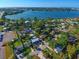 Aerial view showcasing home's waterfront location at 113 Colonia W Ln, Nokomis, FL 34275