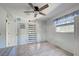 Cozy bedroom with tile floors and window coverings at 113 Colonia W Ln, Nokomis, FL 34275