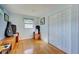 Cozy bedroom with hardwood floors and ample closet space at 113 Colonia W Ln, Nokomis, FL 34275