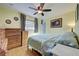 Spacious bedroom with wood floors and dresser at 113 Colonia W Ln, Nokomis, FL 34275