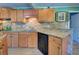 Updated kitchen with granite countertops and stainless steel appliances at 113 Colonia W Ln, Nokomis, FL 34275