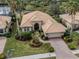 Single-Gathering home with a large backyard and palm trees at 114 Medici Ter, North Venice, FL 34275