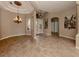 Grand entryway with tile floors and decorative columns at 114 Medici Ter, North Venice, FL 34275