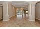 Spacious living room with tile floors and views of the pool at 114 Medici Ter, North Venice, FL 34275