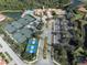Aerial view of tennis courts and clubhouse at 114 Medici Ter, North Venice, FL 34275