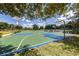 Outdoor basketball court with multiple hoops at 11584 Dancing River Dr, Venice, FL 34292