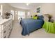 Guest bedroom with window, ceiling fan, and neutral color palette at 11584 Dancing River Dr, Venice, FL 34292