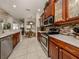 Well-equipped kitchen with ample counter space and stainless steel appliances at 11584 Dancing River Dr, Venice, FL 34292