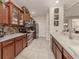 Modern kitchen with stainless steel appliances and a breakfast bar at 11584 Dancing River Dr, Venice, FL 34292