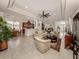 Open concept living room, kitchen, and dining area at 11584 Dancing River Dr, Venice, FL 34292