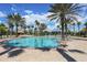 Resort-style pool with lounge chairs and palm trees at 11584 Dancing River Dr, Venice, FL 34292