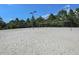 Sand volleyball court with net at 11584 Dancing River Dr, Venice, FL 34292