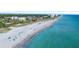 Aerial view of beach with the ocean and people swimming in the ocean at 1200 Tarpon Center Dr # 108, Venice, FL 34285