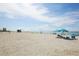 Scenic beach view with clear skies and oceanfront relaxation at 1200 Tarpon Center Dr # 108, Venice, FL 34285