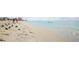 Picturesque beach scene with sandy shoreline and clear blue waters at 1200 Tarpon Center Dr # 108, Venice, FL 34285
