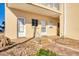 Charming building entrance with two doors and small steps leading to unit at 1200 Tarpon Center Dr # 108, Venice, FL 34285
