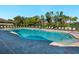 Relaxing resort-style pool with plenty of lounge chairs at 12000 Blazing Star Dr, Venice, FL 34293