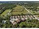 Aerial view of a community of villas and condos at 121 Preserve Pl # A, Nokomis, FL 34275