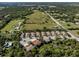Aerial view of a community of villas and condos at 121 Preserve Pl # A, Nokomis, FL 34275