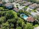 Community pool and surrounding homes from above at 121 Preserve Pl # A, Nokomis, FL 34275