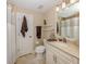 Clean bathroom with a vanity, toilet, and shower at 121 Preserve Pl # A, Nokomis, FL 34275